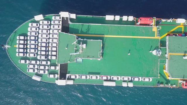 Aerial footage of a Large RoRo (Roll on/off) Vehicle carrie vessel cruising the Mediterranean sea