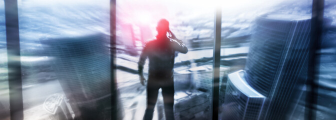 Fototapeta premium Silhouettes of people walking in the street near skyscrapers and modern office buildings. Multiple exposure blurred image. Economy, finances, business concept illustration. Conseptual. 