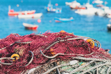 Fishing nets against the background of fishing boats in the gulf.