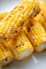 Stack of roasted corn on the cob