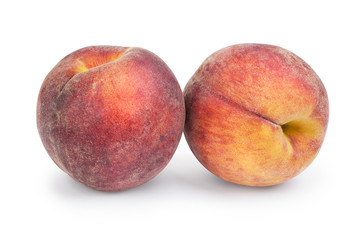 Two ripe fluffy peach