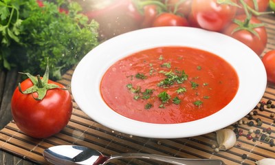Fresh tomato soup on desk