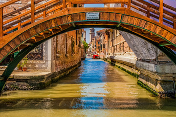 Fototapeta na wymiar View up Venice Canal Under Bridges
