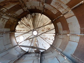 Inside of a Rusted, Damaged Metal Grain Silo