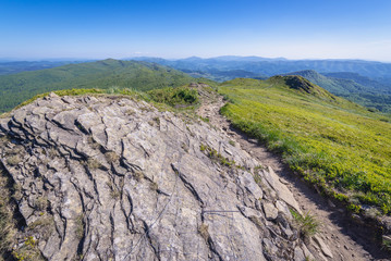 Fototapeta premium Hiking trail on the mount Rozsypaniec in Bieszczady National Park, Subcarpathian Voivodeship of Poland