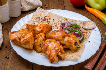 chicken kebab on board