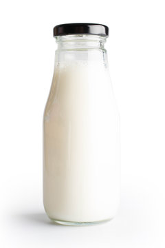 Milk bottle on white background