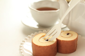 homemade swiss roll and English tea