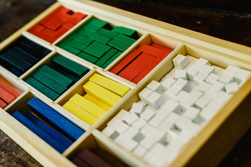 Fototapeta premium Blocks of different sizes and colors to build shapes and count.
