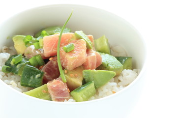 Raw tuna fish and avocado on rice for Japanese food image