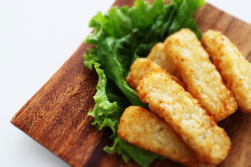 Hash brown potato on lettuce for snack food image
