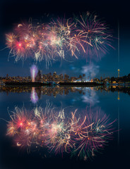 Seattle skyline and fireworks with reflections