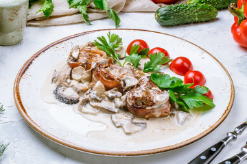 Pork medallions with bacon