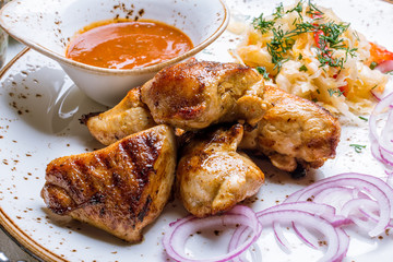 chicken kebab on board