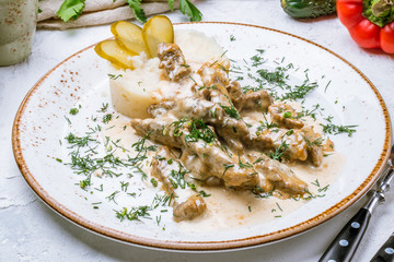 Stroganoff on white plate