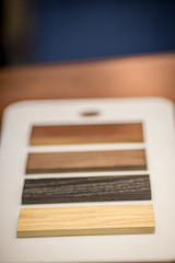 The wood, the color of the wood, but what kind, choose the way you want, make customers decide.