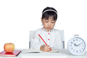 Asian Chinese Little Girl doing homework