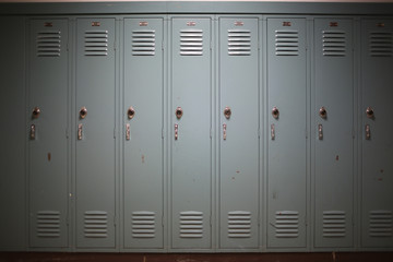 Back to School Concept - Light Blue Gray Student Lockers at a High School or College