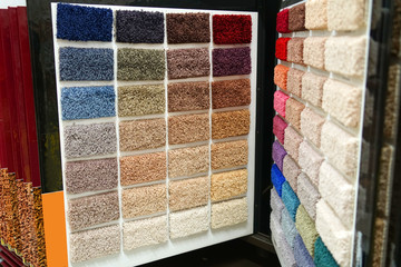 Colorful carpet samples in the store