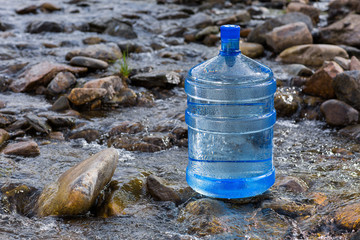 Natural mineral water in a large bottle - 217811968