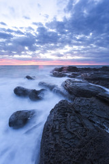 Waves and Rocks at Beach at Sunrise, 