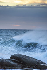 Obraz premium Waves and Rocks at Beach at Sunrise, 