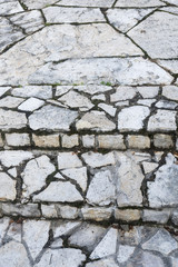 Stairs made of stones outside.