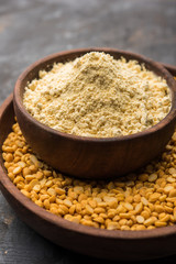 Besan, Gram or chickpea flour or powder is a pulse flour made from a variety of ground chickpea known as Bengal gram. popular ingredient for Pakora/pakoda or bajji snack. Selective focus