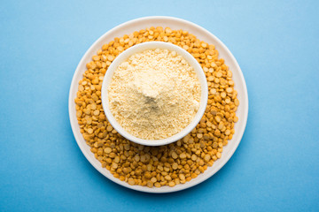 Besan, Gram or chickpea flour or powder is a pulse flour made from a variety of ground chickpea known as Bengal gram. popular ingredient for Pakora/pakoda or bajji snack. Selective focus