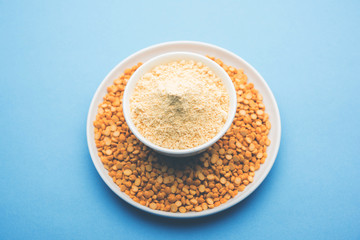 Besan, Gram or chickpea flour or powder is a pulse flour made from a variety of ground chickpea known as Bengal gram. popular ingredient for Pakora/pakoda or bajji snack. Selective focus