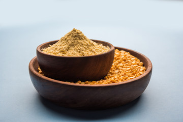 Besan, Gram or chickpea flour or powder is a pulse flour made from a variety of ground chickpea known as Bengal gram. popular ingredient for Pakora/pakoda or bajji snack. Selective focus