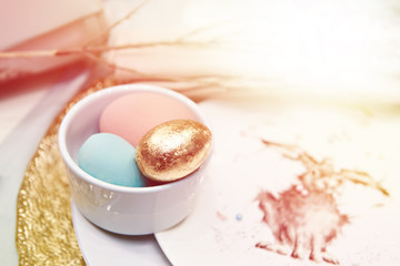 Golden Easter egg and rabbit