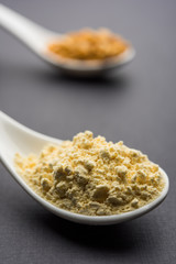 Besan, Gram or chickpea flour or powder is a pulse flour made from a variety of ground chickpea known as Bengal gram. popular ingredient for Pakora/pakoda or bajji snack. Selective focus