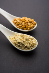 Besan, Gram or chickpea flour or powder is a pulse flour made from a variety of ground chickpea known as Bengal gram. popular ingredient for Pakora/pakoda or bajji snack. Selective focus