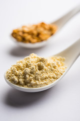 Besan, Gram or chickpea flour or powder is a pulse flour made from a variety of ground chickpea known as Bengal gram. popular ingredient for Pakora/pakoda or bajji snack. Selective focus