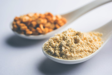 Besan, Gram or chickpea flour or powder is a pulse flour made from a variety of ground chickpea known as Bengal gram. popular ingredient for Pakora/pakoda or bajji snack. Selective focus