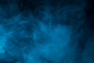 Colorful smoke close-up on a black background