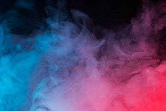 Colorful smoke close-up on a black background