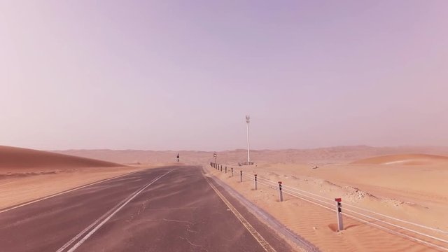 New road from Oasis Liwa to Moreeb Dune in Rub al Khali desert stock footage video
