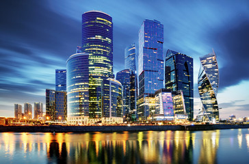 Plakat Moscow City skyline . Moscow International Business Centre at night time with Moskva river.