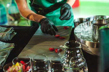 championship among coffee houses, members of teams show barista's skill, prepare drinks, teamwork