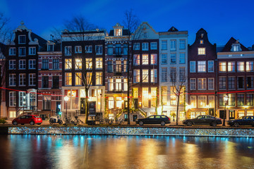 Light object named floating on a thousand memories, along the quay wall of the Herengracht during the Light Festival in Amsterdam © julia700702