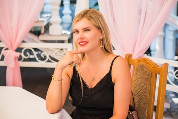 Outdoor portrait of a beautiful middle aged blonde woman. attractive lady and her lifestyle after 35 years 