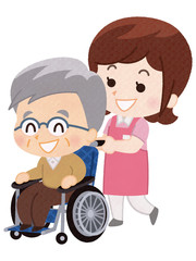 車椅子の男性と介護職員の女性
