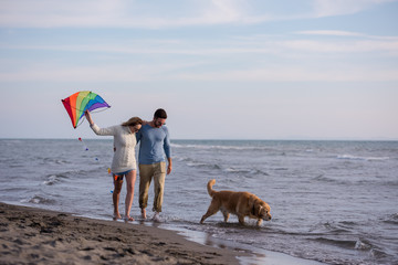 happy couple enjoying time together at beach