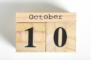 Wooden cubes with date on white background. 10th of October