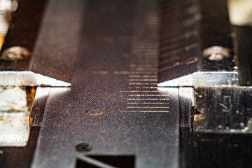 Measuring toolsSlide calipers, numbers and scale of division on a measuring instrument, close-up.