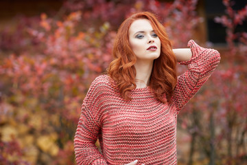 Outdoor  lifestyle photo of young beautiful lady. red hair . Warm autumn. Warm spring