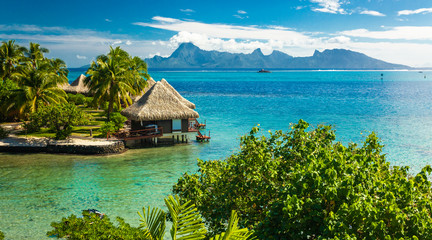 Overwater bungalows with best beach for snorkeling, Tahiti, French Polynesia - obrazy, fototapety, plakaty