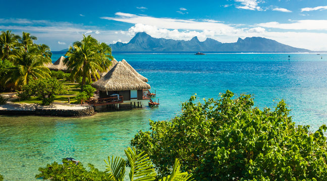 Overwater bungalows with best beach for snorkeling, Tahiti, French Polynesia